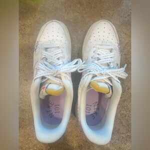 Nike Women’s White Sneakers with Purple and Yellow Accents